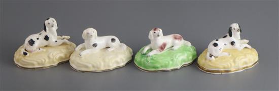 Four Samuel Alcock porcelain figures of recumbent King Charles spaniels, c.1835-50, L. 7cm